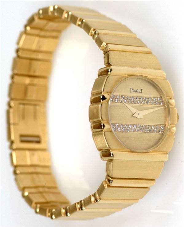 The Piaget 861C701 Women
s Yellow Gold Champagne Dial 861C701 Women
s Yellow Gold Champagne Dial Polo 861c701 Ladies watch is shown at a front angle, highlighting the 18k gold case, diamond-accented dial, and bracelet.