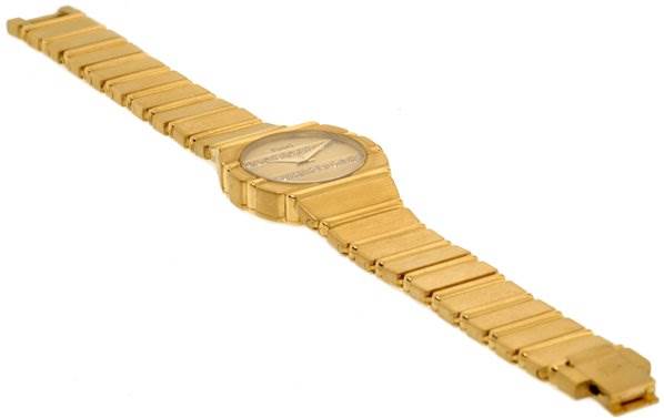 The image shows a side view of the 18k Gold Diamonds Polo 861c701 Ladies watch by Piaget 861C701 Women
s Yellow Gold Champagne Dial 861C701 Women
s Yellow Gold Champagne Dial, highlighting the strap and case.
