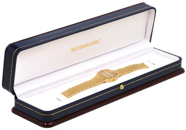 The image shows a Ladies 18k Gold Diamonds Polo 861c701 model by Piaget 861C701 Women
s Yellow Gold Champagne Dial 861C701 Women
s Yellow Gold Champagne Dial in its open display box, viewed from a side angle.