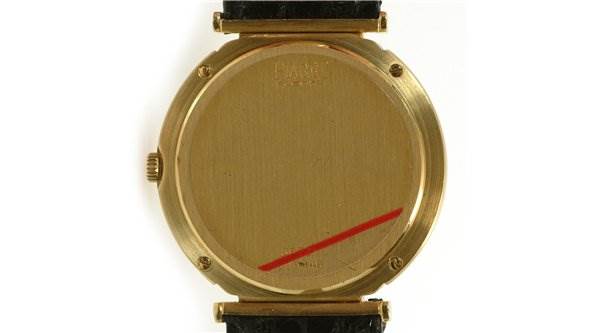 This image shows the back of the Piaget 8673 Men's Yellow Gold Champagne Dial 8673 Men's Yellow Gold Champagne Dial Polo 8673 men's 18k yellow gold watch.