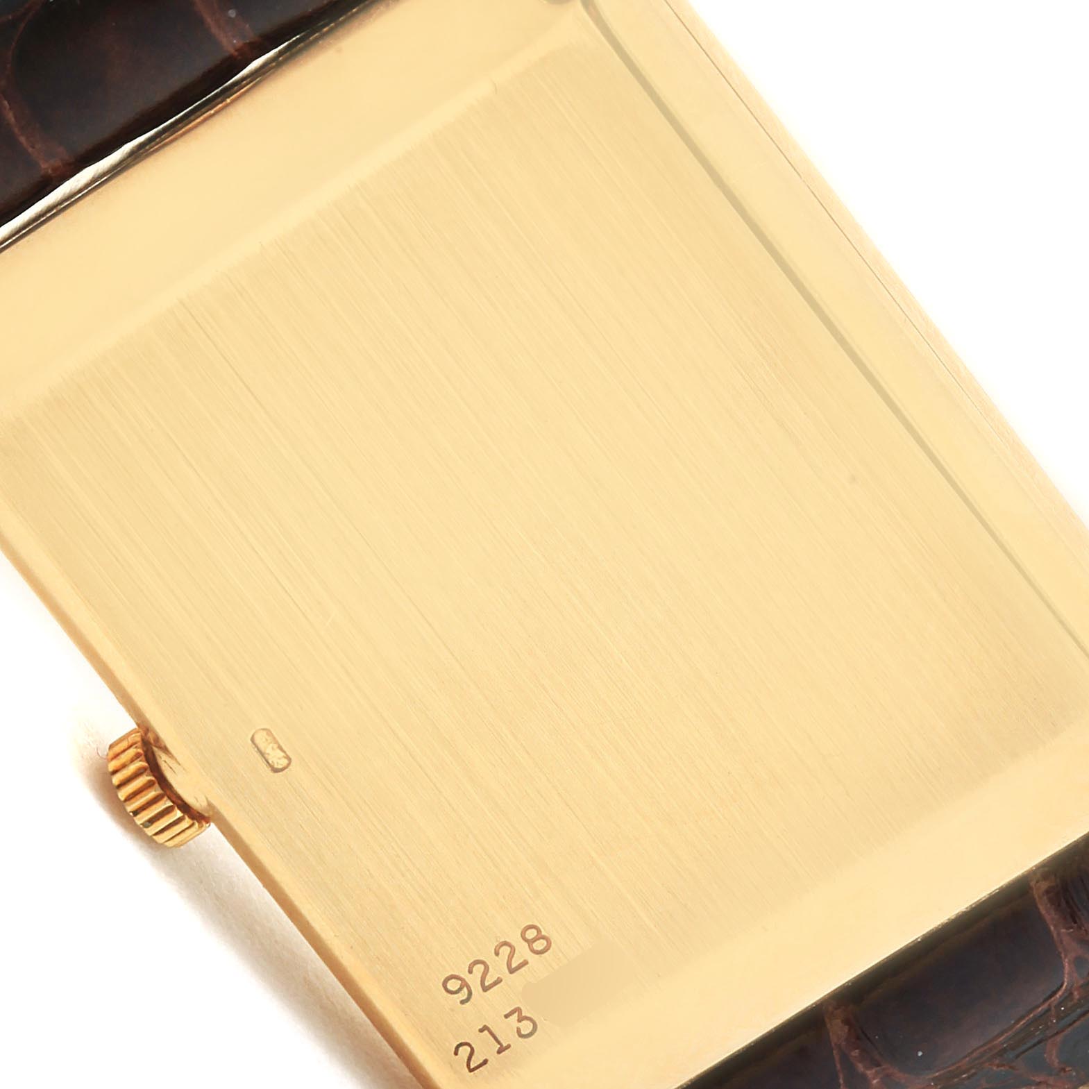 The image shows the back case of the Piaget 9228 Women's Yellow Gold Brown Dial 9228 Women's Yellow Gold Brown Dial model 9228 18K Yellow Gold Tiger Eye Stone Dial Ladies Watch.