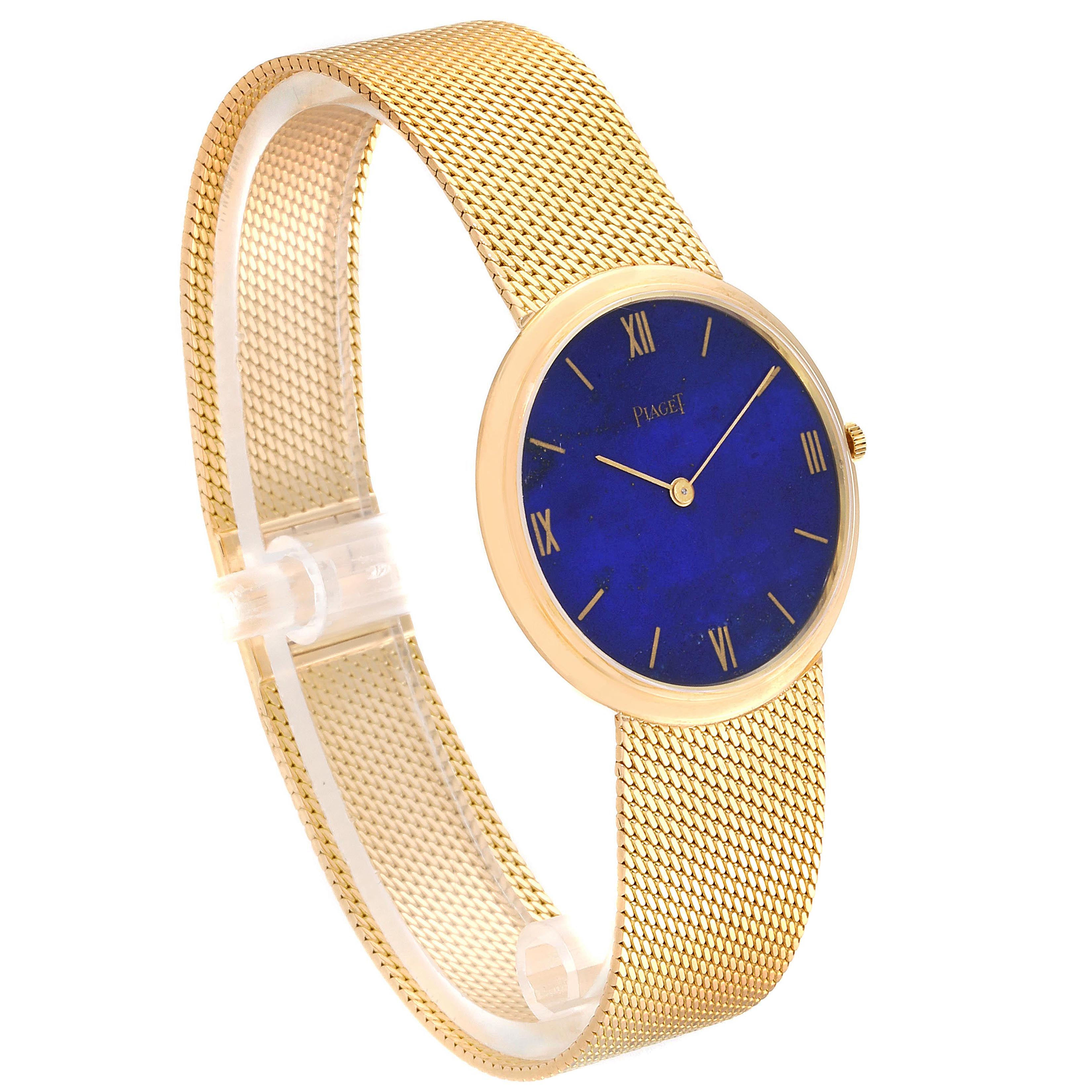 The image shows a Piaget 902B11 Men
s Yellow Gold Blue Dial 902B11 Men
s Yellow Gold Blue Dial 18k Yellow Gold Lapis Lazuli Dial Vintage Men
s Watch 902B11 at an angled side view, highlighting its mesh band and blue dial.