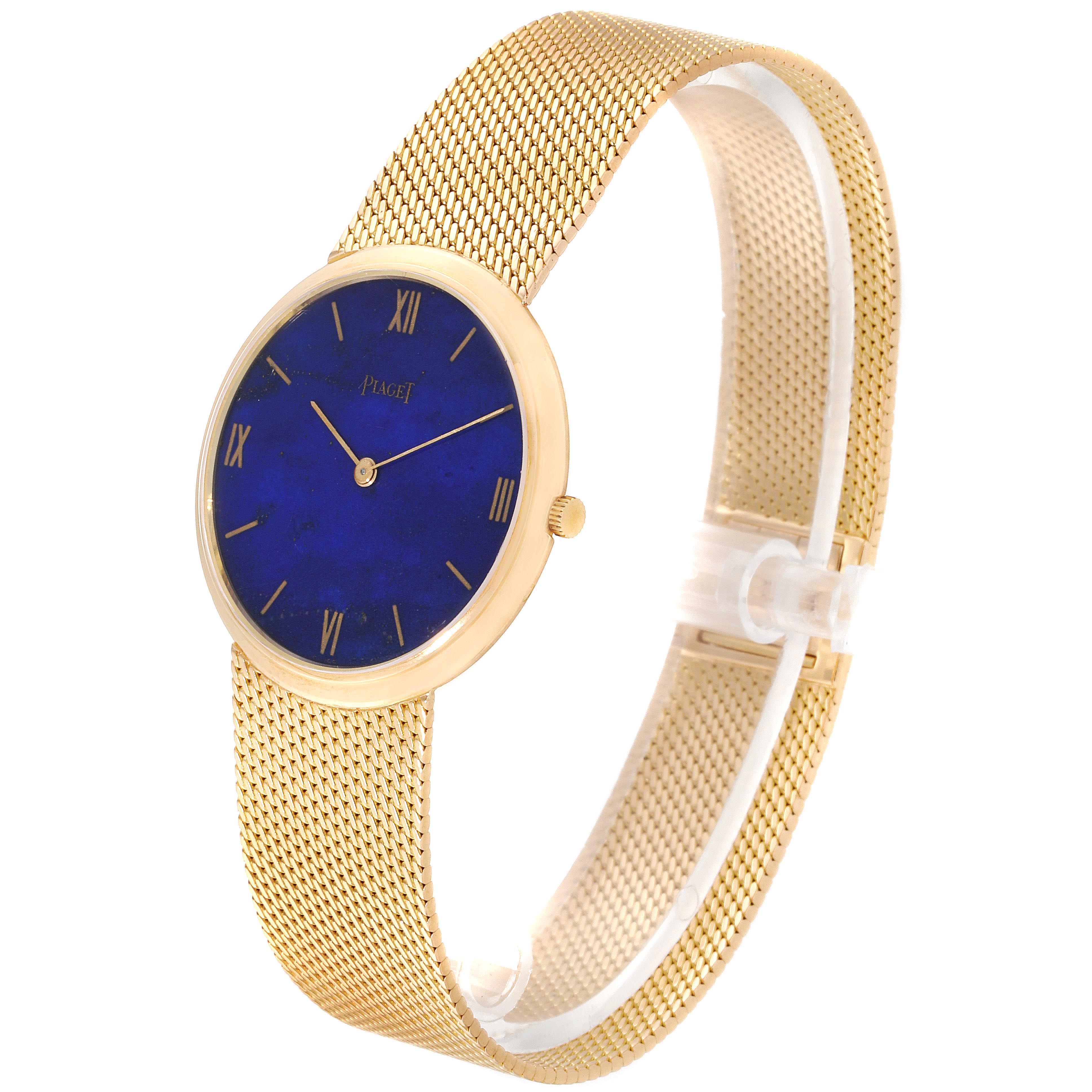 The image shows a side angle view of the Piaget 902B11 Men
s Yellow Gold Blue Dial 902B11 Men
s Yellow Gold Blue Dial 902B11 18k Yellow Gold Lapis Lazuli Dial Vintage Men
s Watch, displaying the dial and mesh band.