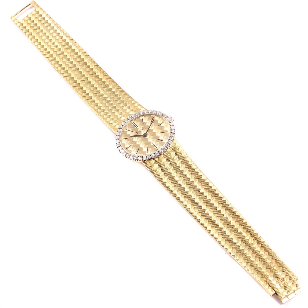 This image shows a full view of the Piaget 9806 Women
s Yellow Gold Champagne Dial 9806 Women
s Yellow Gold Champagne Dial 9806 18k Yellow Gold Diamond Ladies Watch, including the face and bracelet.