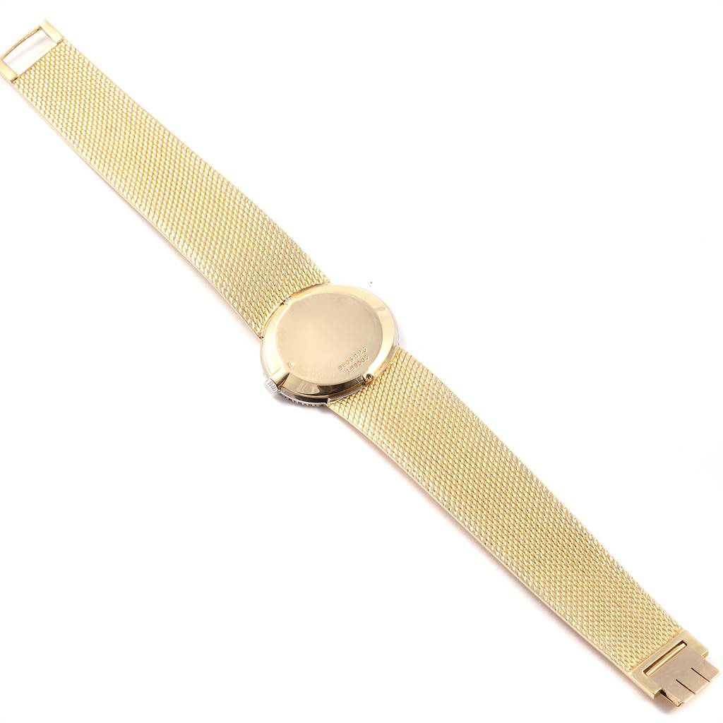 The image shows the back view of the Piaget 9806 Women
s Yellow Gold Champagne Dial 9806 Women
s Yellow Gold Champagne Dial 9806, 18k Yellow Gold Diamond Ladies Watch, highlighting its strap and case.