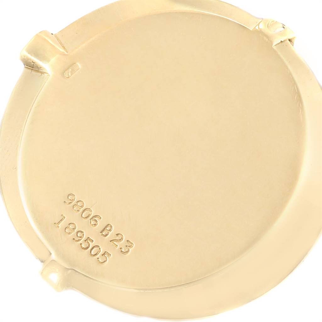 This image shows the back of the Piaget 9806 Women
s Yellow Gold Champagne Dial 9806 Women
s Yellow Gold Champagne Dial model 9806 18k Yellow Gold Diamond Ladies Watch.