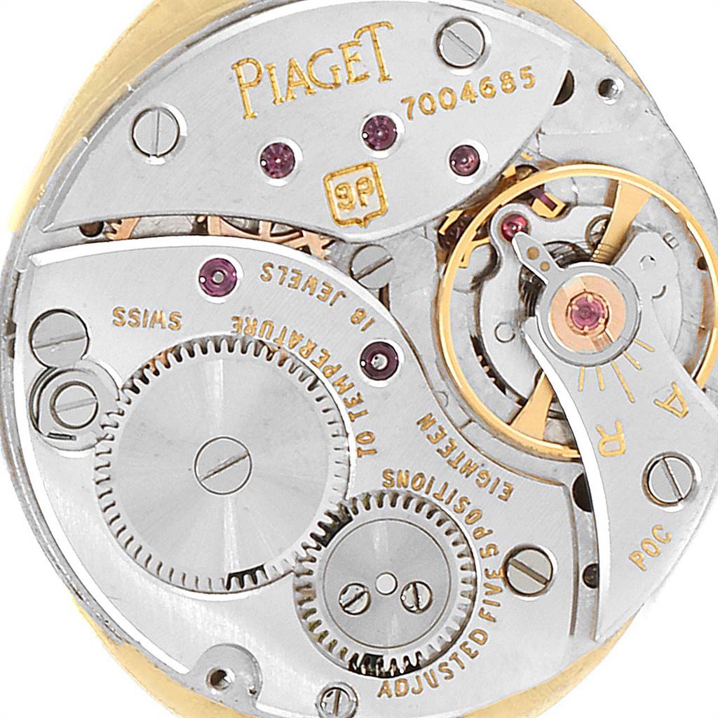 The image shows the inner mechanical movement of the Piaget 9806 Women
s Yellow Gold Champagne Dial 9806 Women
s Yellow Gold Champagne Dial 9806 model 18k Yellow Gold Diamond Ladies Watch.