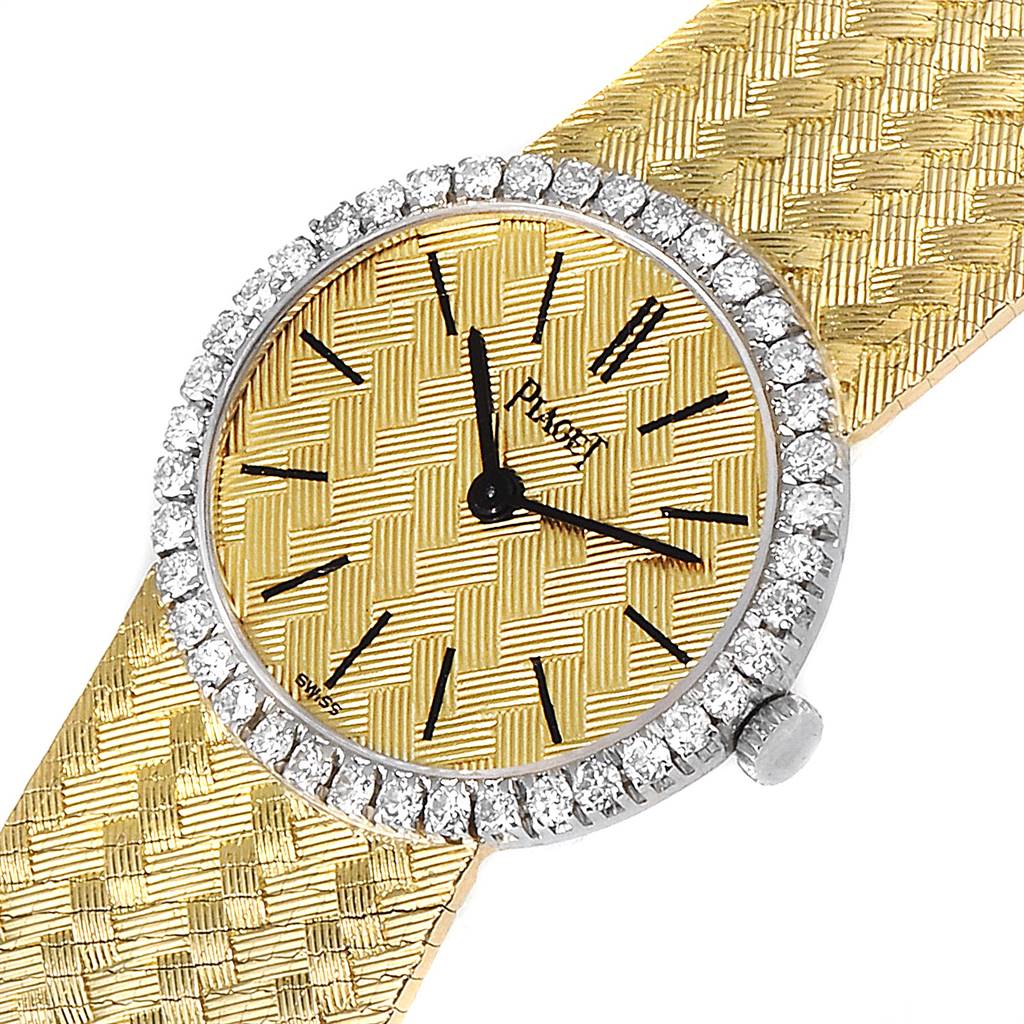 The Piaget 9806 Women
s Yellow Gold Champagne Dial 9806 Women
s Yellow Gold Champagne Dial 9806 model 18k Yellow Gold Diamond Ladies Watch is shown at a slight angle, highlighting the dial, bezel, and part of the strap.