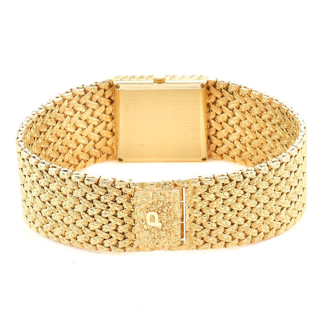 The image shows the back view of the Piaget 9352 Men's Yellow Gold Blue Dial 9352 Men's Yellow Gold Blue Dial 9352 model 18k Yellow Gold Blue Lapis Lazuli Dial Vintage Mens Watch, highlighting the bracelet and clasp.