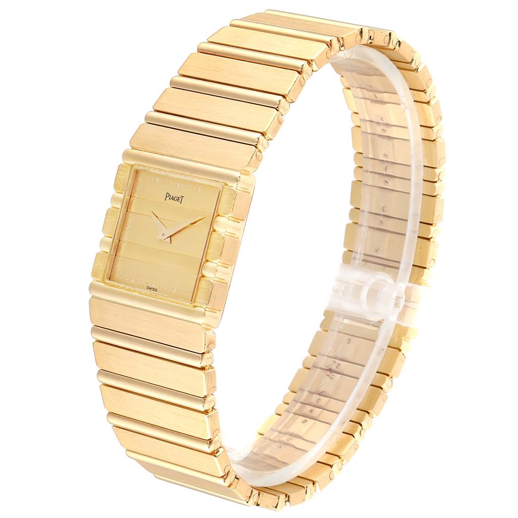 The image shows a side-angle view of the Piaget 7131 C 701 Men's Yellow Gold Champagne Dial 7131 C 701 Men's Yellow Gold Champagne Dial Polo 18K Yellow Gold Men's Watch 7131, displaying its face and bracelet.