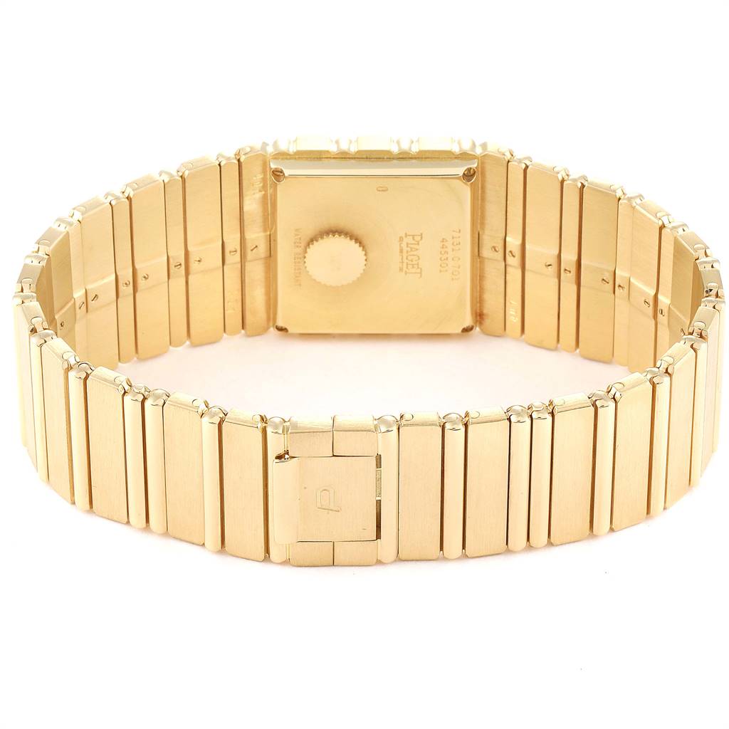 This image shows the back view of the Piaget 7131 C 701 Men's Yellow Gold Champagne Dial 7131 C 701 Men's Yellow Gold Champagne Dial Polo 18K Yellow Gold Mens Watch 7131 model, highlighting its bracelet and clasp.