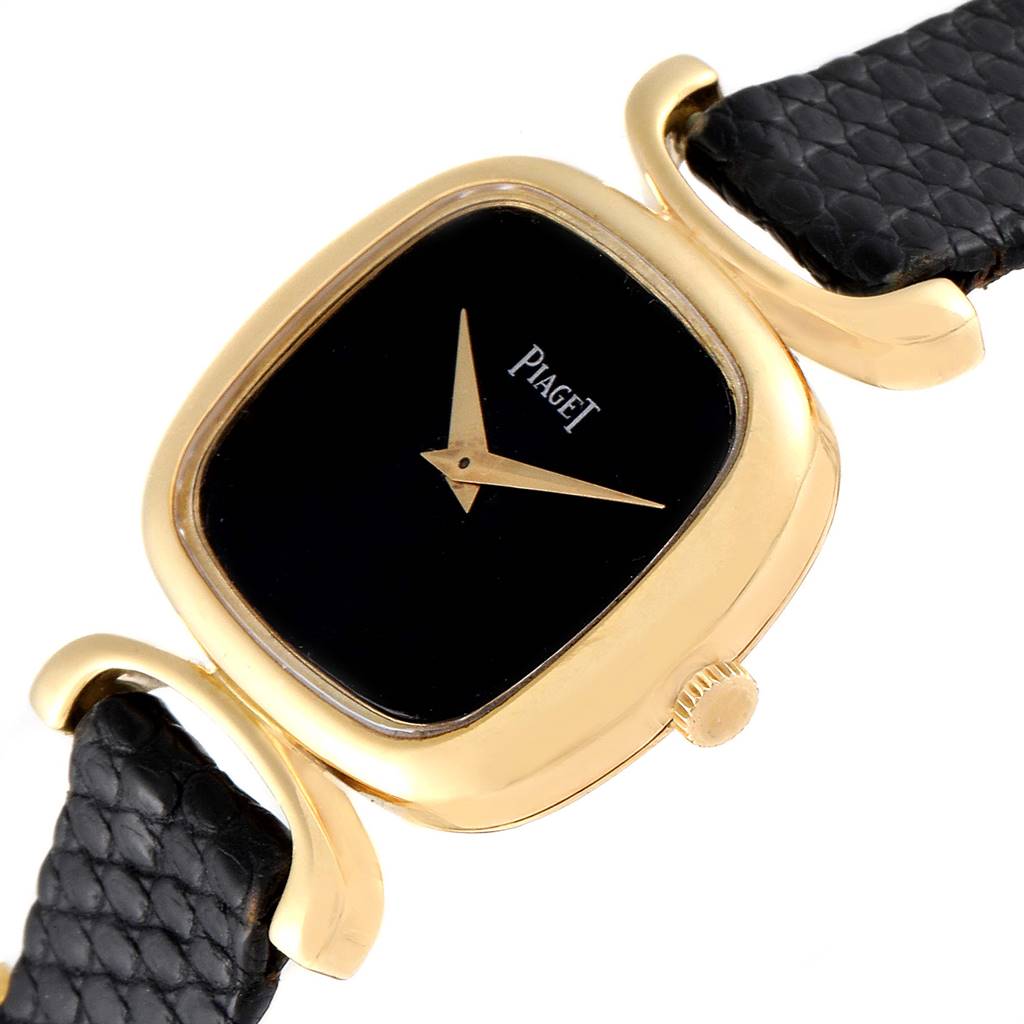 The image shows a close-up angle of the Piaget 9451 Women's Yellow Gold Black Dial 9451 Women's Yellow Gold Black Dial Solo Tempo 9451 model, highlighting its yellow gold case, black onyx dial, and black strap.