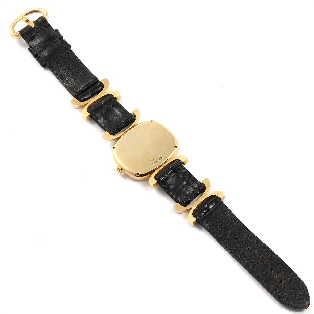 The image shows the back view of a Piaget 9451 Women's Yellow Gold Black Dial 9451 Women's Yellow Gold Black Dial Solo Tempo Yellow Gold Black Onyx Dial Vintage Ladies Watch, model 9451.