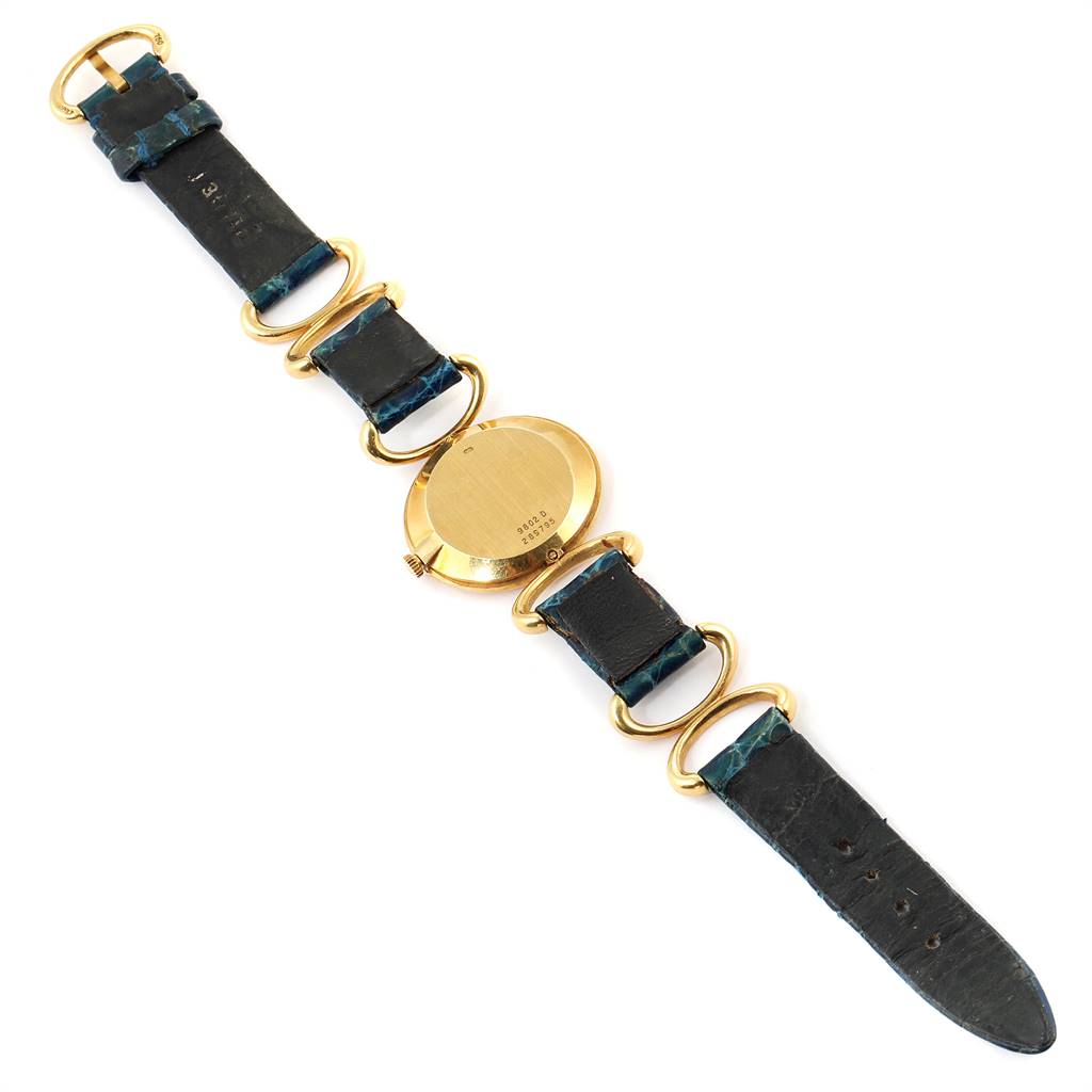 The image shows the back view of a Piaget 9451 Women's Yellow Gold Blue Dial 9451 Women's Yellow Gold Blue Dial Classique Yellow Gold Lapis Dial Vintage Ladies Watch 9451, including its strap and clasp.