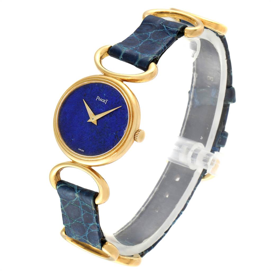 The image shows a Piaget 9451 Women's Yellow Gold Blue Dial 9451 Women's Yellow Gold Blue Dial Classique Yellow Gold Lapis Dial Vintage Ladies Watch 9451 at a slight angle, displaying the watch face, strap, and gold details.