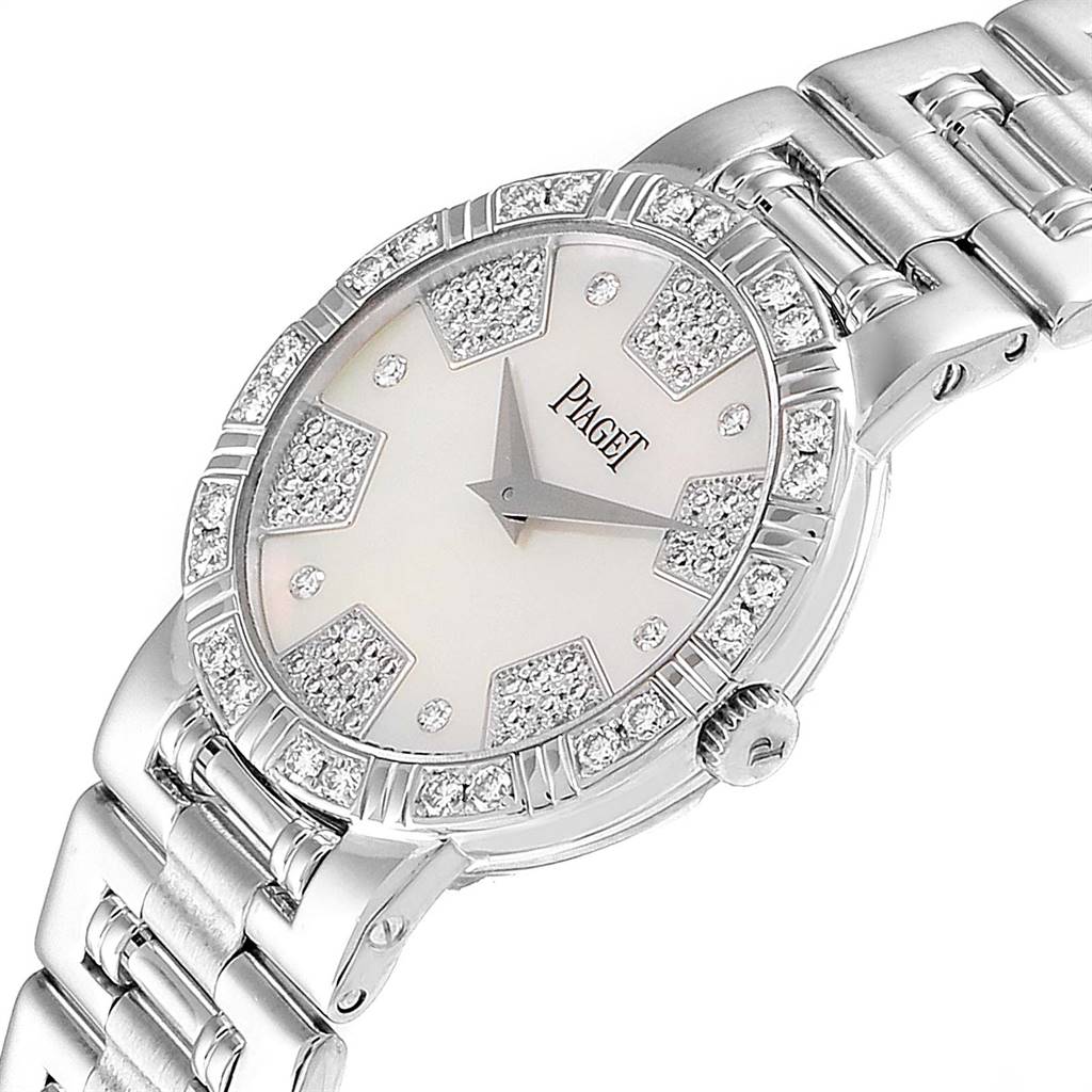 The image shows the face and part of the bracelet of the Piaget 26503K81 Women's White Gold Mother of Pearl Dial 26503K81 Women's White Gold Mother of Pearl Dial Dancer White Gold Mother of Pearl Diamond Ladies Watch 80564 model at an angled view.