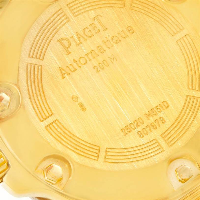 The image shows the case back of the Piaget Men's Yellow Gold Black Dial Men's Yellow Gold Black Dial Polo Key Dive 18K Yellow and White Gold Men's Watch, model 25020.