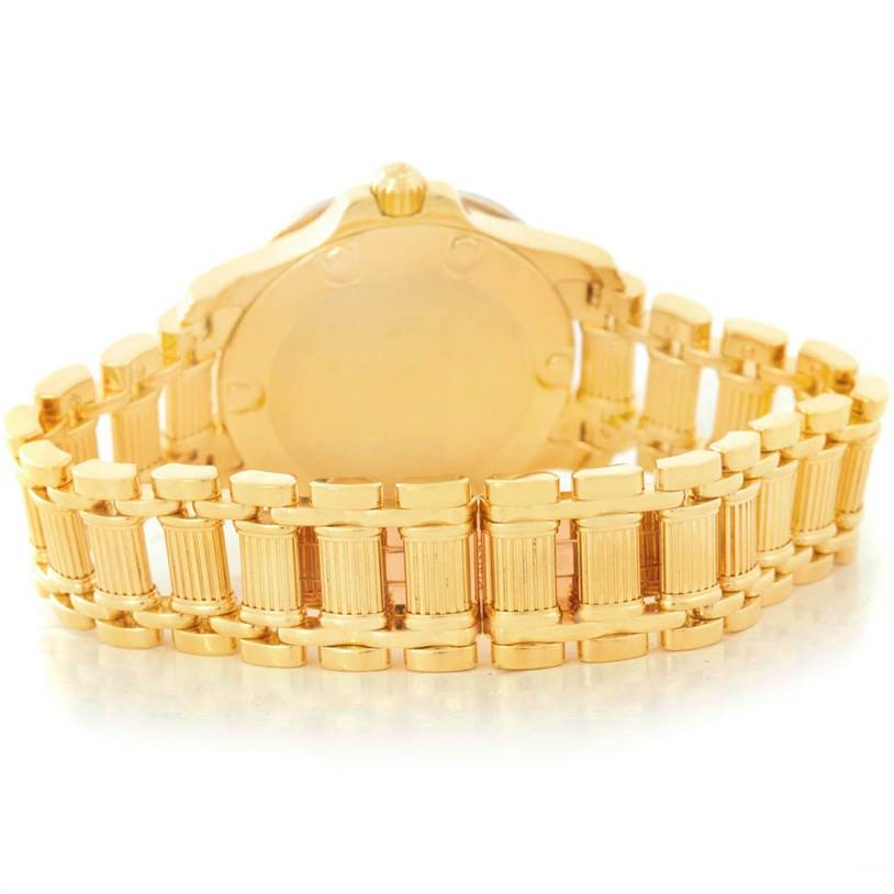 The Piaget Men's Yellow Gold Black Dial Men's Yellow Gold Black Dial Polo Key Dive 18K Yellow and White Gold Mens Watch 25020 is shown from a rear angle, focusing on its bracelet and caseback.