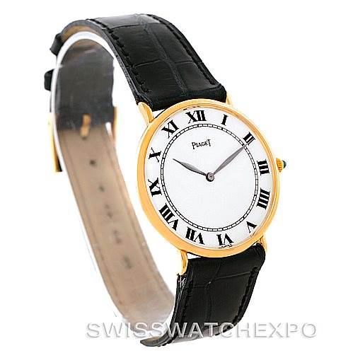 The image shows a side angle of the Piaget 9035 Men
s Yellow Gold White Dial 9035 Men
s Yellow Gold White Dial 18K Yellow Gold Mechanical Men
s Watch 9035, displaying the face, bezel, and leather strap.