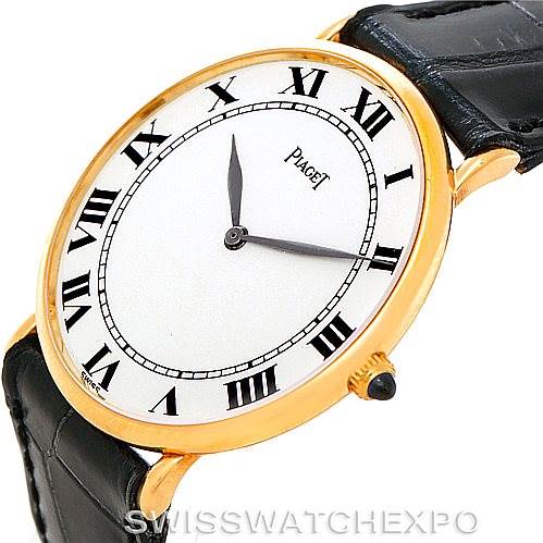 The image shows a Piaget 9035 Men
s Yellow Gold White Dial 9035 Men
s Yellow Gold White Dial 18K Yellow Gold Mechanical Men
s Watch, model 9035, viewed from an angled front perspective highlighting its dial and crown.