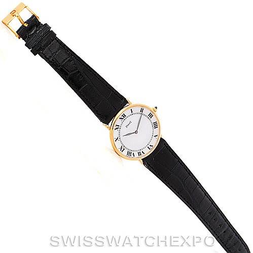 The image shows a top-down view of a Piaget 9035 Men
s Yellow Gold White Dial 9035 Men
s Yellow Gold White Dial 18K Yellow Gold Mechanical Men
s Watch 9035, displaying its case, dial, and black leather strap.