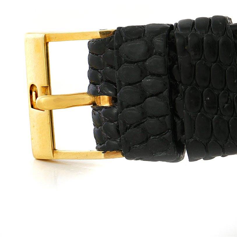 This image shows the black leather strap and gold buckle of the Piaget 9025 Men's Yellow Gold White Dial 9025 Men's Yellow Gold White Dial 9025 18K Yellow Gold Mechanical Men's Watch.