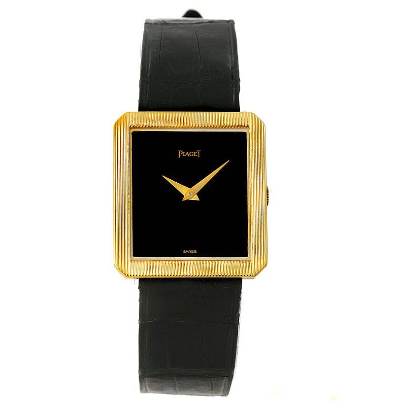 The image shows a front view of the Piaget 9154 Men's Yellow Gold Black Dial 9154 Men's Yellow Gold Black Dial 9154 model, featuring an 18K yellow gold cushion shape case and black leather strap.