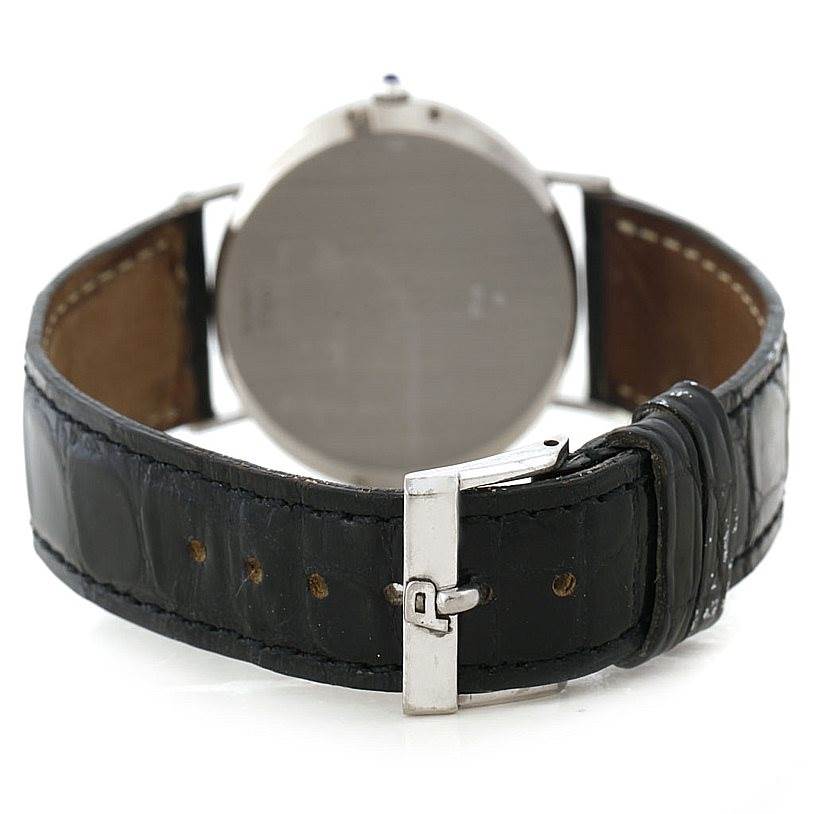 The image shows the rear view of the Piaget 12501 Men's White Gold White Dial 12501 Men's White Gold White Dial 18K White Gold Automatic Men's Watch 12501, highlighting its black leather strap and buckle.