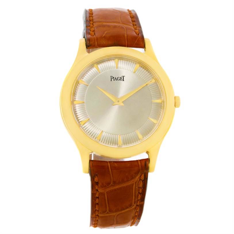 The image shows a front view of the Piaget 91000 Men's Yellow Gold Silver Dial 91000 Men's Yellow Gold Silver Dial 91000 model 18K Yellow Gold Mechanical Limited Edition Men's Watch, highlighting its face and brown leather strap.