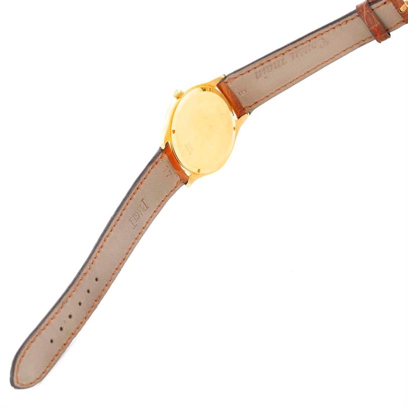 The image shows the back and side view of the Piaget 91000 Men's Yellow Gold Silver Dial 91000 Men's Yellow Gold Silver Dial 91000 model, highlighting its 18K yellow gold case and leather strap.