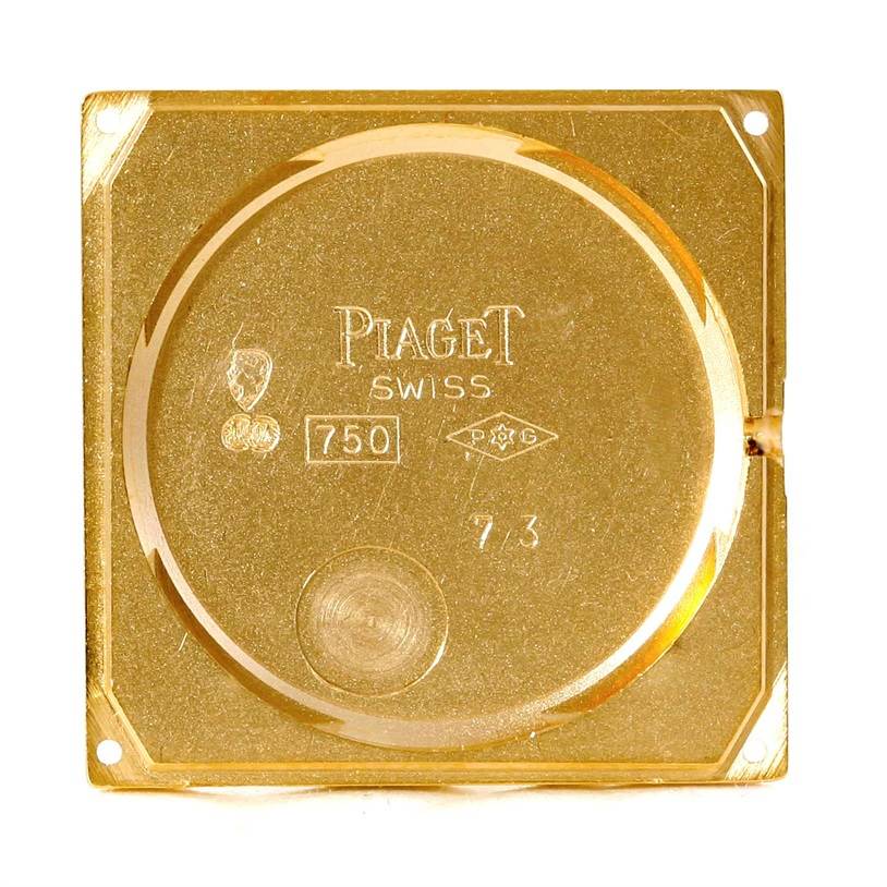 The image shows the back cover of a Piaget Men's Yellow Gold Champagne Dial Men's Yellow Gold Champagne Dial 18K Yellow Gold Cushion Shape Diamond Mechanical Mens Watch.