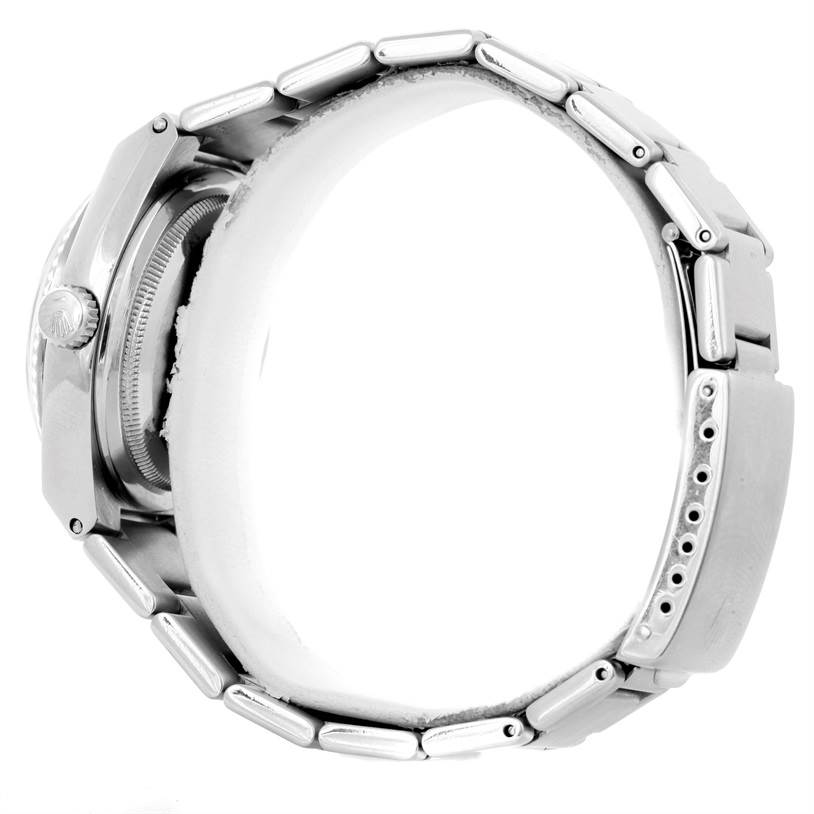 The image shows a side view of a Rolex Oysterquartz 17000 Men
s Stainless Steel White Dial 17000 Men
s Stainless Steel White Dial watch, highlighting the case, bracelet, and clasp details.