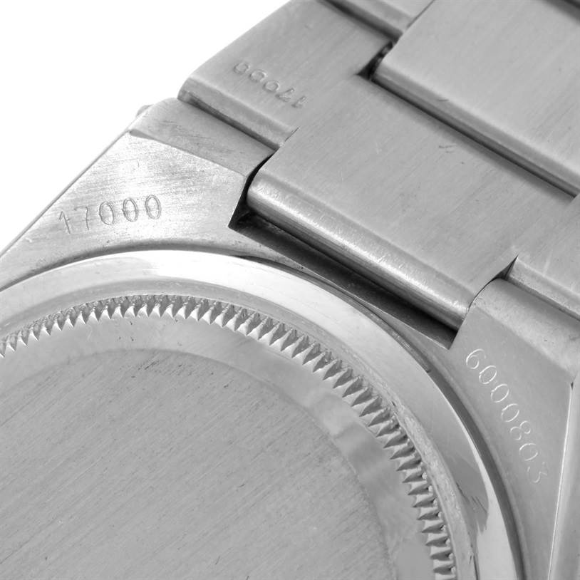 The image shows a close-up of the back case and bracelet of a Rolex Oysterquartz 17000 Men
s Stainless Steel White Dial 17000 Men
s Stainless Steel White Dial watch.