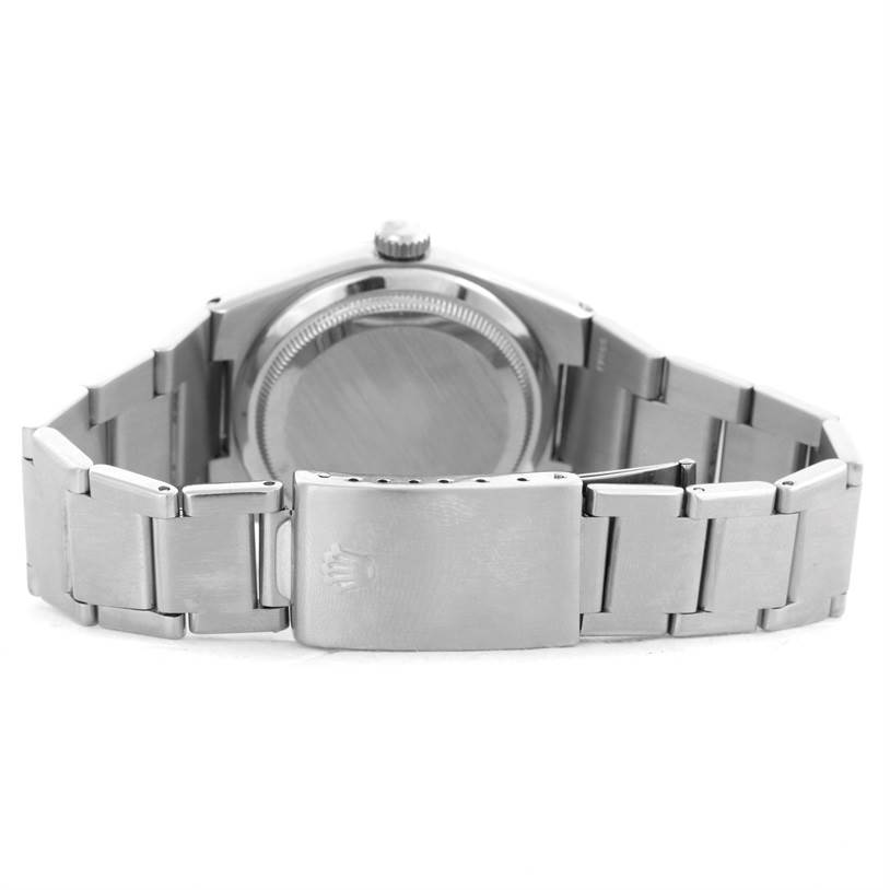 This is a rear view of the Rolex Oysterquartz 17000 Men
s Stainless Steel White Dial 17000 Men
s Stainless Steel White Dial watch, showing the case back and metal bracelet.