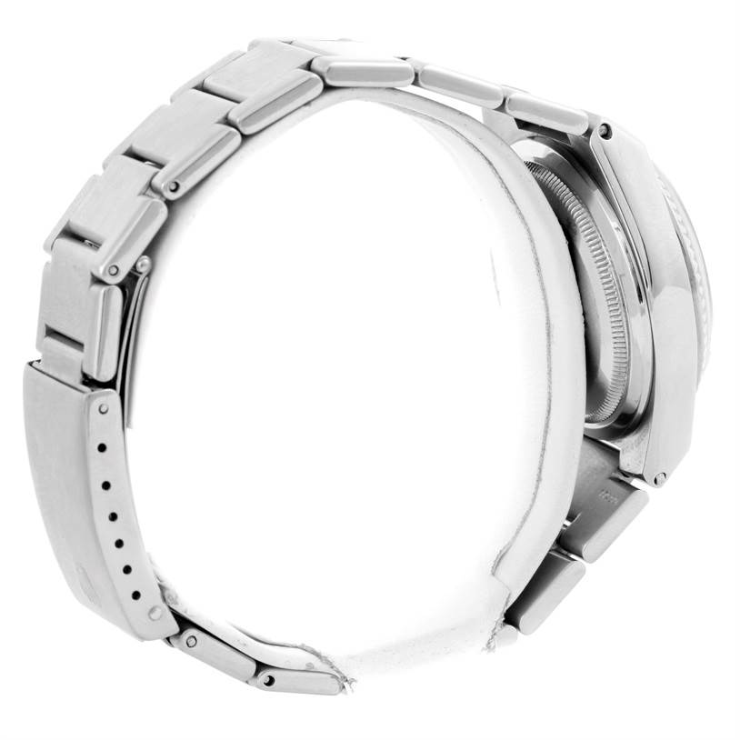 The image shows a side view of the Oysterquartz model by Rolex, highlighting the bracelet and caseback.