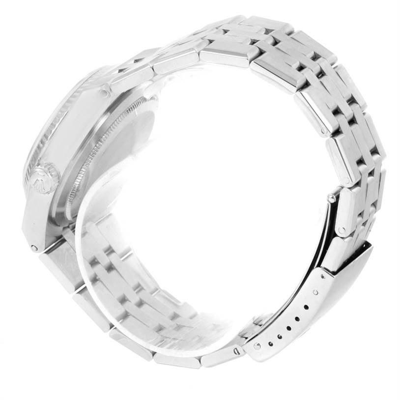 The image shows a side view of a Rolex Oysterquartz 17014 Men's Stainless Steel White Dial 17014 Men's Stainless Steel White Dial watch, highlighting the bracelet, clasp, and part of the case.