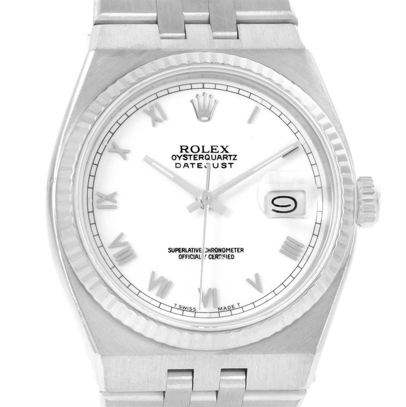This image shows a close-up view of the Rolex Oysterquartz 17014 Men's Stainless Steel White Dial 17014 Men's Stainless Steel White Dial Datejust watch, focusing on its dial, bezel, and part of its bracelet.