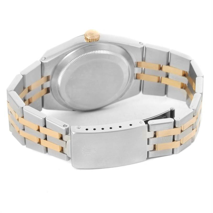 This image shows the back view of a Rolex Oysterquartz 17013 Men's Stainless Steel White Dial 17013 Men's Stainless Steel White Dial watch featuring its case back, crown, and two-tone bracelet.