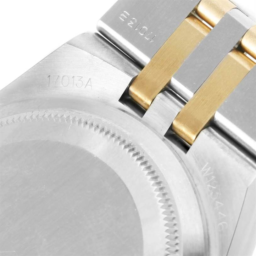 This image shows the rear case and bracelet attachment of a Rolex Oysterquartz 17013 Men's Stainless Steel White Dial 17013 Men's Stainless Steel White Dial model.