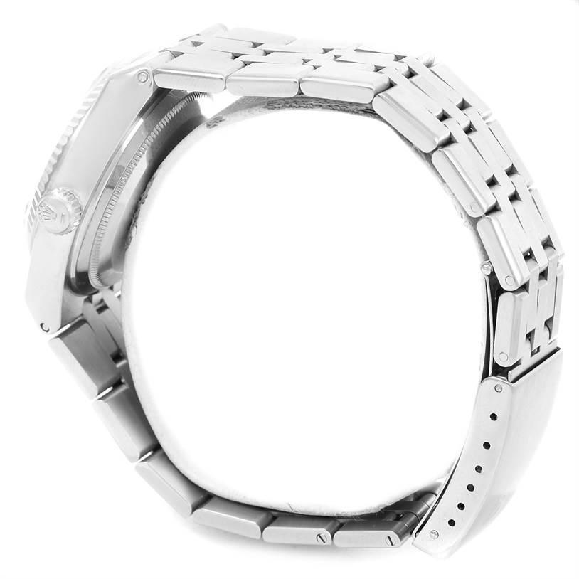 The image shows a side view of a Rolex Oysterquartz 17014 Men's Stainless Steel White Dial 17014 Men's Stainless Steel White Dial watch, focusing on the bracelet and case.