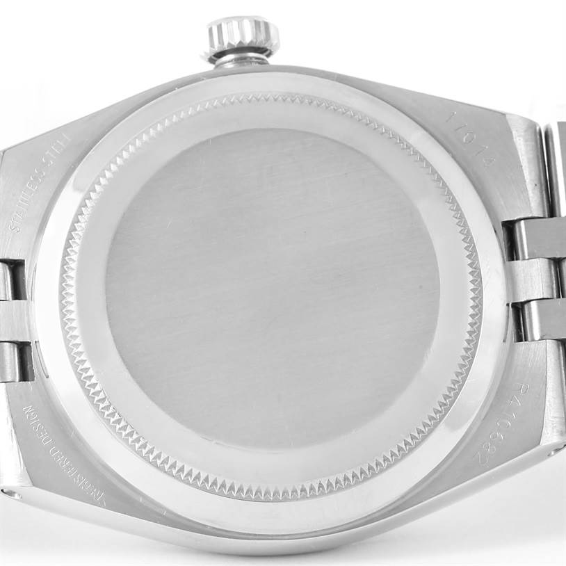 The image shows the back view of the Rolex Oysterquartz 17014 Men's Stainless Steel White Dial 17014 Men's Stainless Steel White Dial watch, including the case back and part of the bracelet.