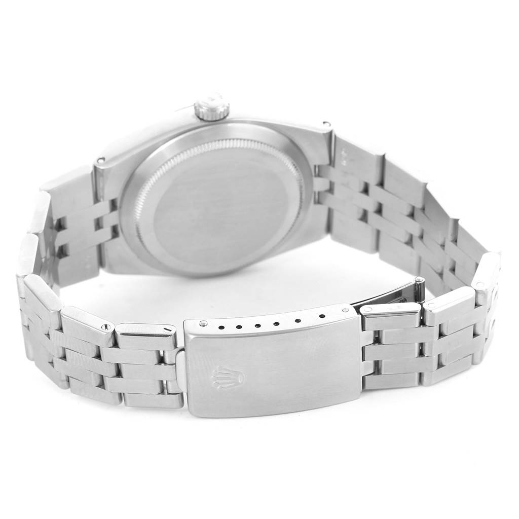 The image shows the back case and bracelet of a Rolex Oysterquartz 17014 Men's Stainless Steel White Dial 17014 Men's Stainless Steel White Dial watch, viewed from an angle that highlights the clasp and band.