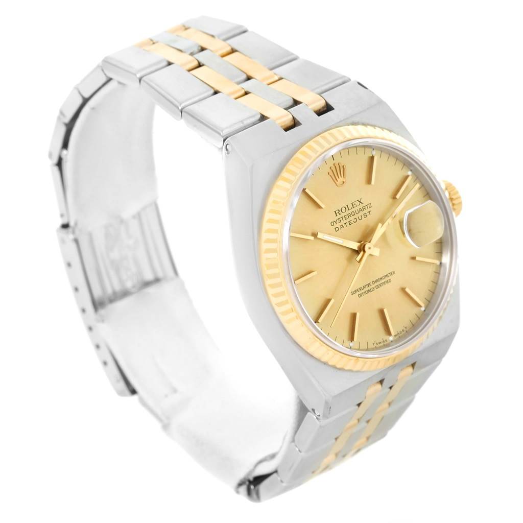 The image shows a side angle of a Rolex Oysterquartz 17013 Men's Stainless Steel Champagne Dial 17013 Men's Stainless Steel Champagne Dial watch, highlighting the dial, bezel, and part of the bracelet.