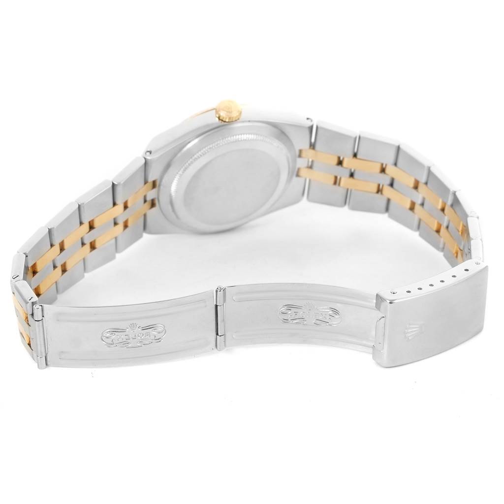 The image shows the backside and clasp of a Rolex Oysterquartz 17013 Men's Stainless Steel Champagne Dial 17013 Men's Stainless Steel Champagne Dial watch with a two-tone band.
