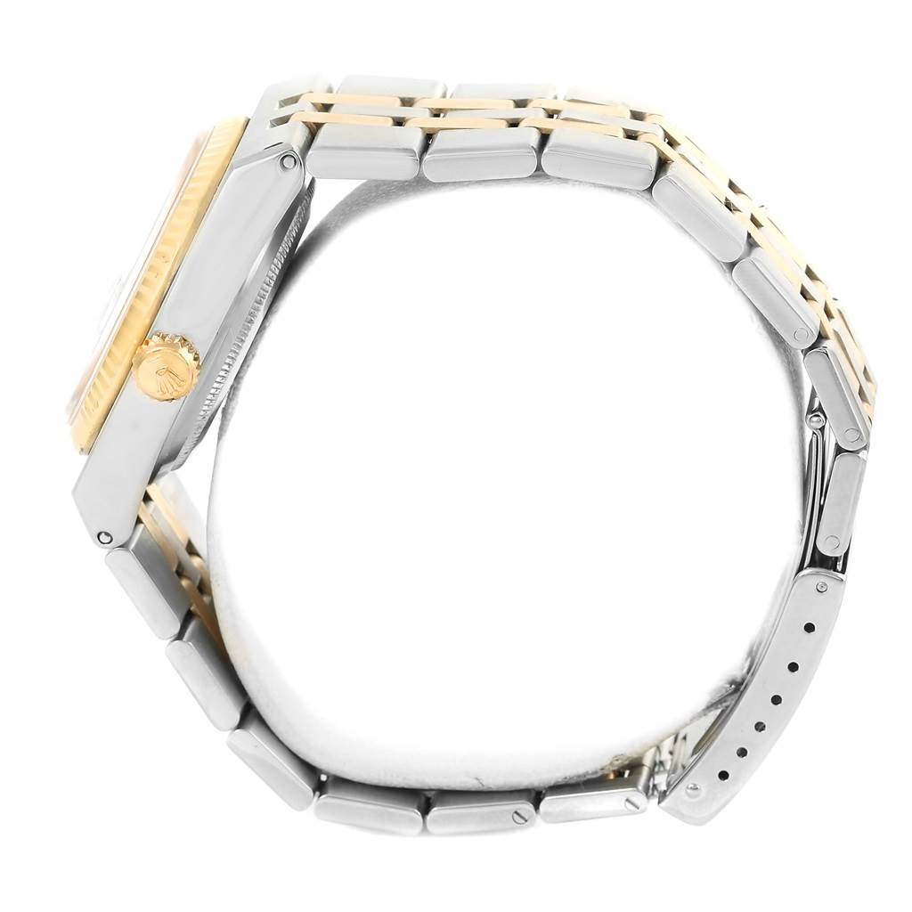 The image shows a side profile of the Rolex Oysterquartz 17013 Men's Stainless Steel Champagne Dial 17013 Men's Stainless Steel Champagne Dial watch, highlighting its case, crown, and bracelet.