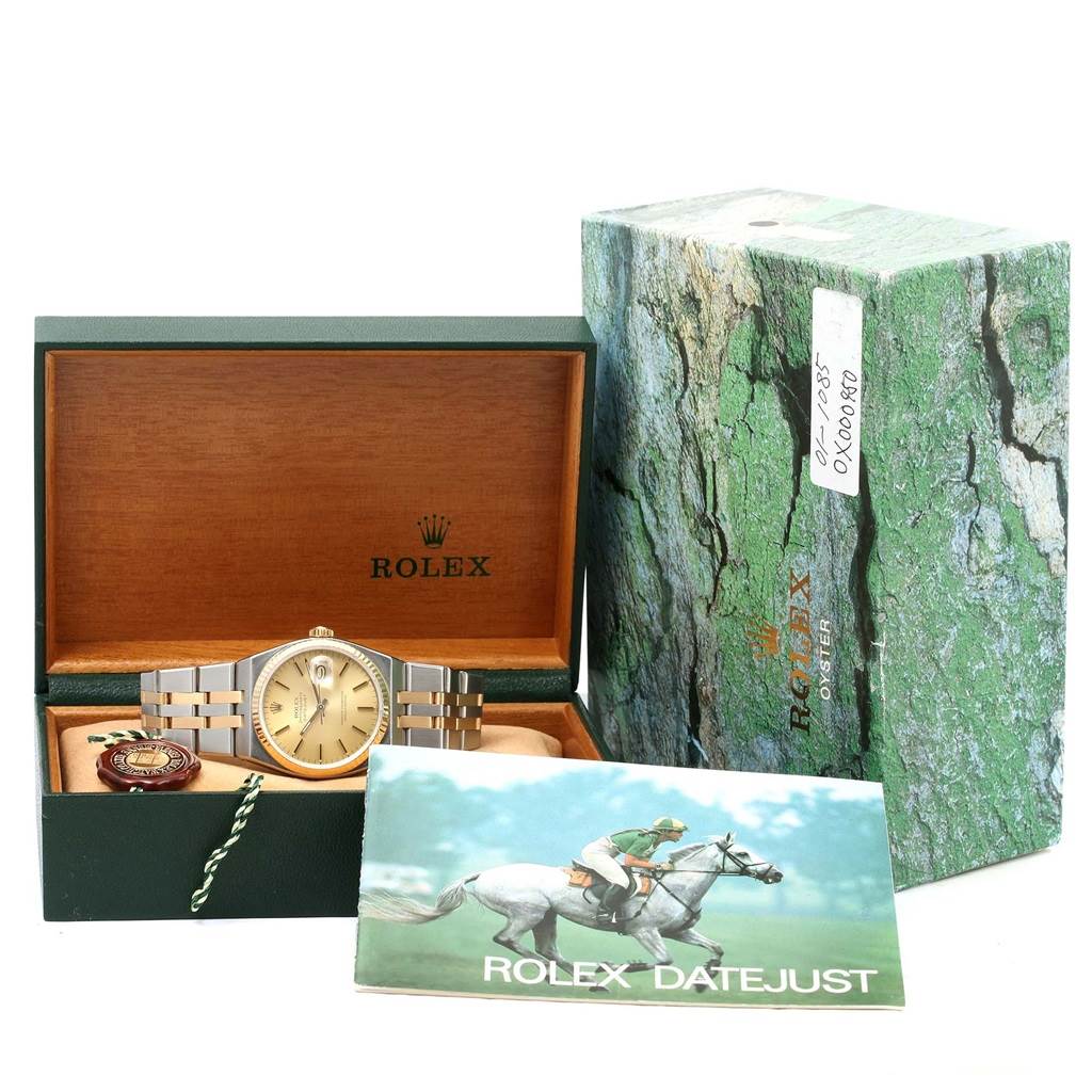 The image shows a Rolex Oysterquartz 17013 Men
s Stainless Steel Champagne Dial 17013 Men
s Stainless Steel Champagne Dial watch at a front angle, with its box, paperwork, and accessories.