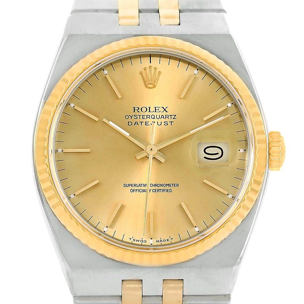 This image shows a front view of a Rolex Oysterquartz 17013 Men
s Stainless Steel Champagne Dial 17013 Men
s Stainless Steel Champagne Dial Datejust watch, highlighting the dial, hands, date window, and part of the bracelet.