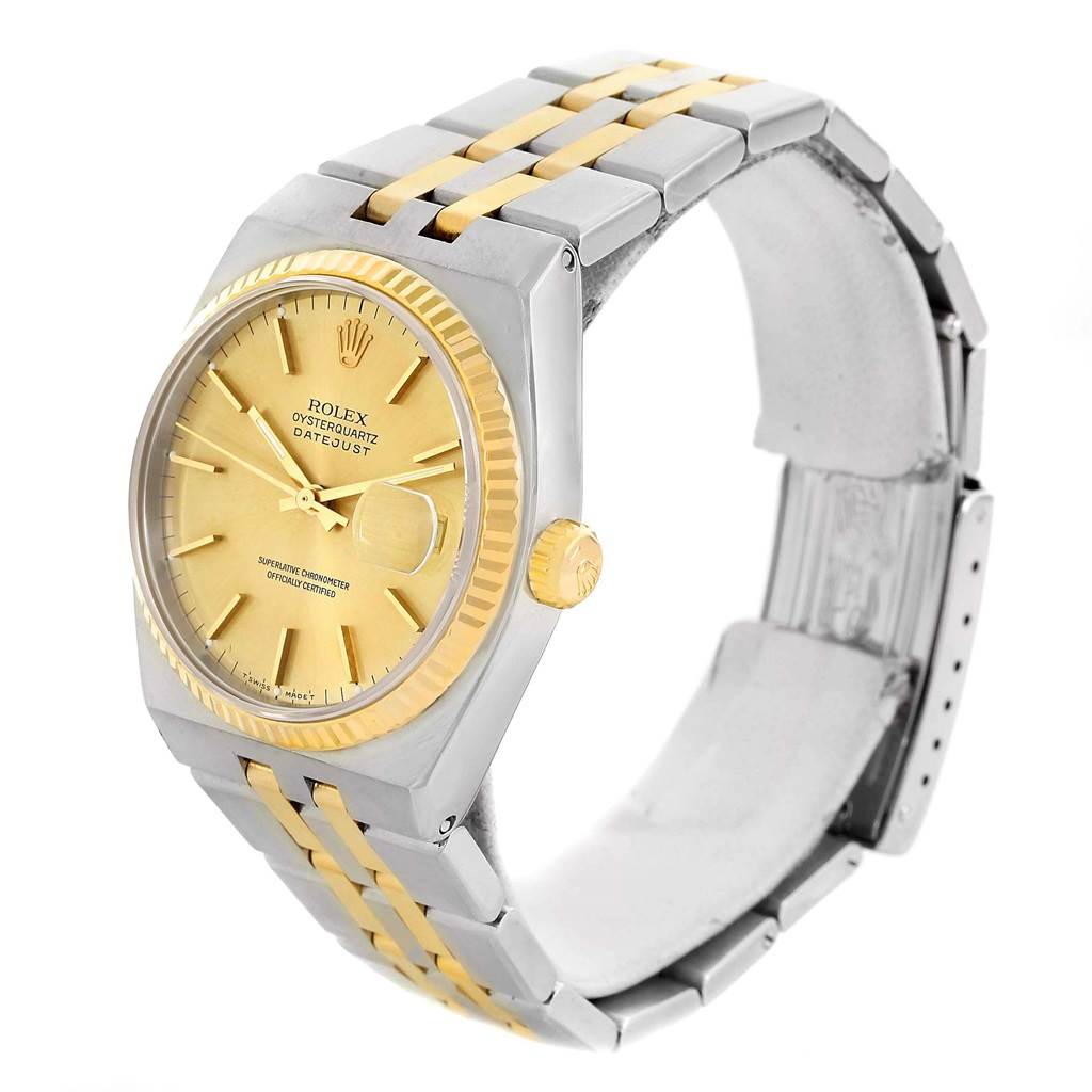 The Rolex Oysterquartz 17013 Men
s Stainless Steel Champagne Dial 17013 Men
s Stainless Steel Champagne Dial watch is shown at an angle, displaying the dial, bezel, crown, and part of the bracelet.