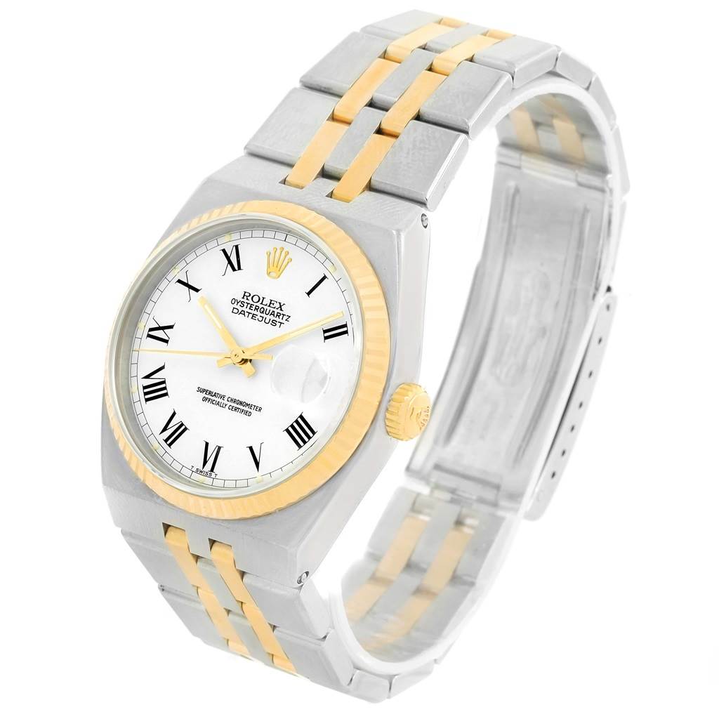 The Rolex Oysterquartz 17013 Men's Stainless Steel White Dial 17013 Men's Stainless Steel White Dial watch is shown in a three-quarter view, displaying the face, bezel, crown, and two-tone bracelet.