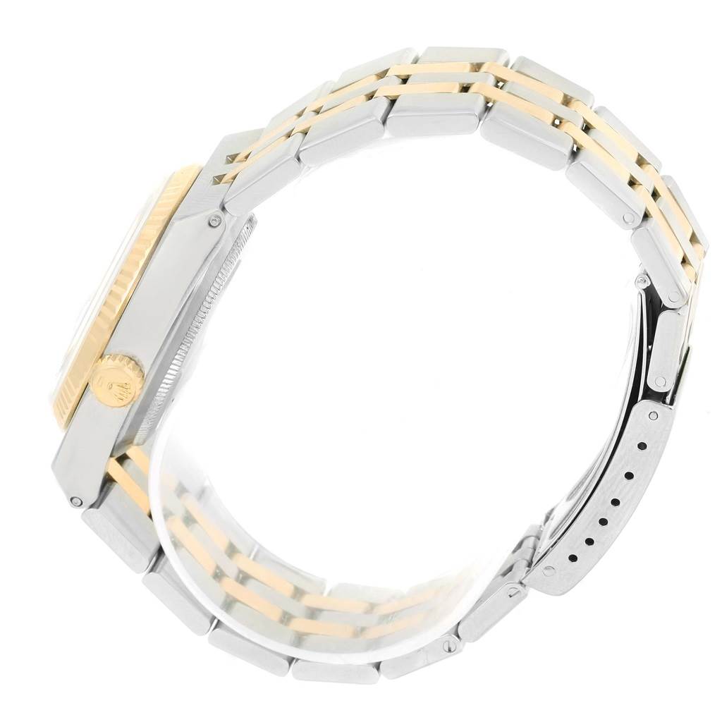 This image shows a side view of the Rolex Oysterquartz 17013 Men's Stainless Steel White Dial 17013 Men's Stainless Steel White Dial watch, focusing on the bracelet and crown.